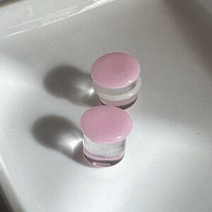 Pink and Clear Round Plugs